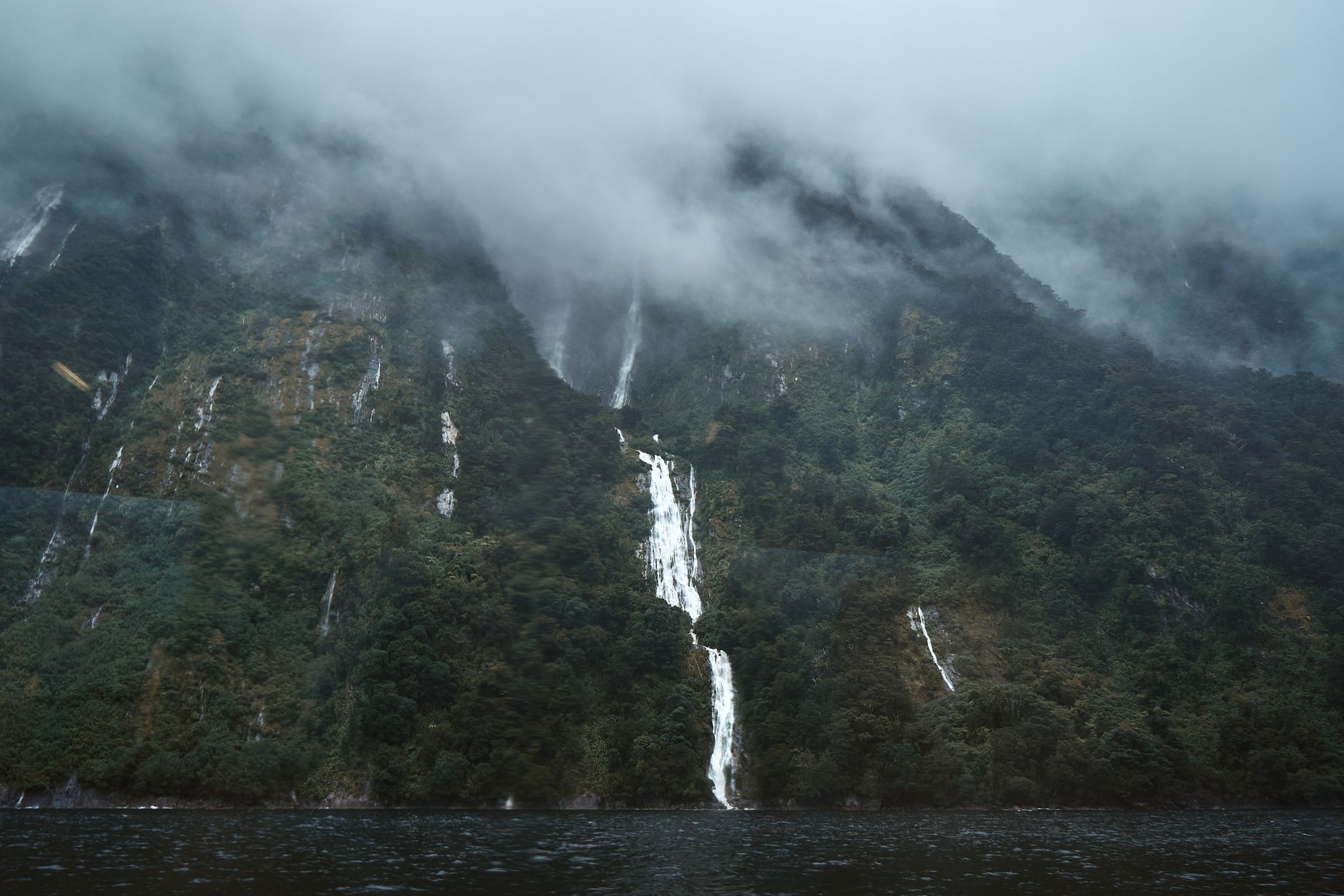 Milford Track hanging valleys and cascading waterfalls