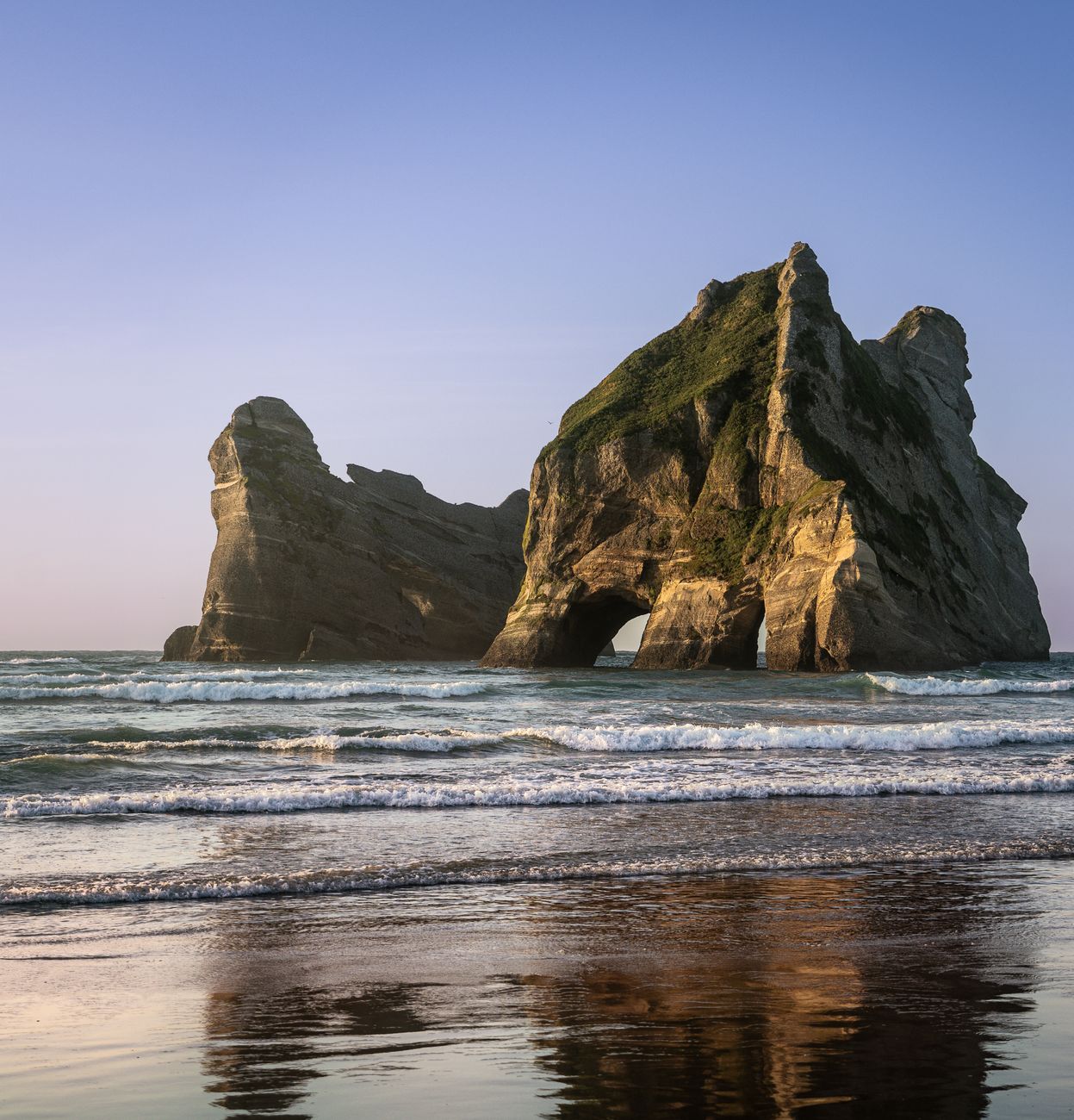 North Island coastal beach with sea arch